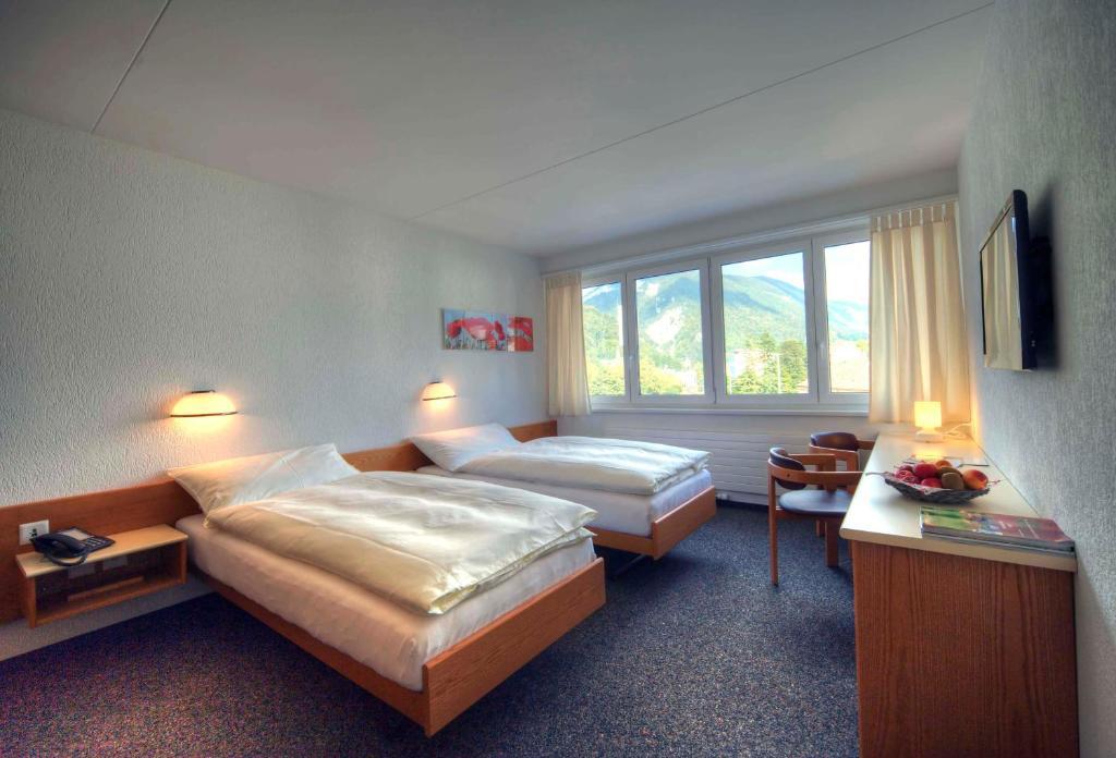 Hôtel Oasis Moutier Quarto foto